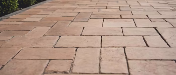 laying-gray-concrete-paving-slabs-house-courtyard-driveway-patio-professional-workers-bricklayers-are-installing-new-tiles-slabs-driveway-sidewalk-patio-leveled-sand-foundation-base_140282-7229 laying-gray-concrete-paving-slabs-house-courtyard-driveway-patio-professional-workers-bricklayers-are-installing-new-tiles-slabs-driveway-sidewalk-patio-leveled-sand-foundation-base_140282-7229