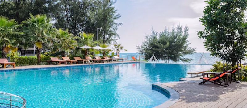 sea-view-swimming-pool-with-sunbed_63313-567 sea-view-swimming-pool-with-sunbed_63313-567